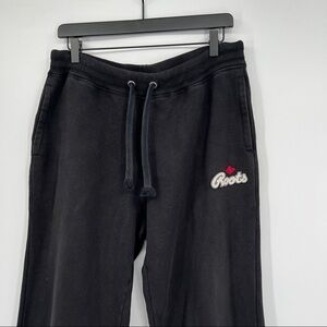 Roots 73 Athletics faded black logo embroidered wide leg pull-on pants.